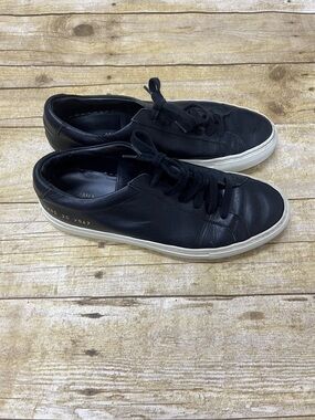 Woman by Common Projects Black Leather Low-Top Lace-Up Sneakers size 7 (?)